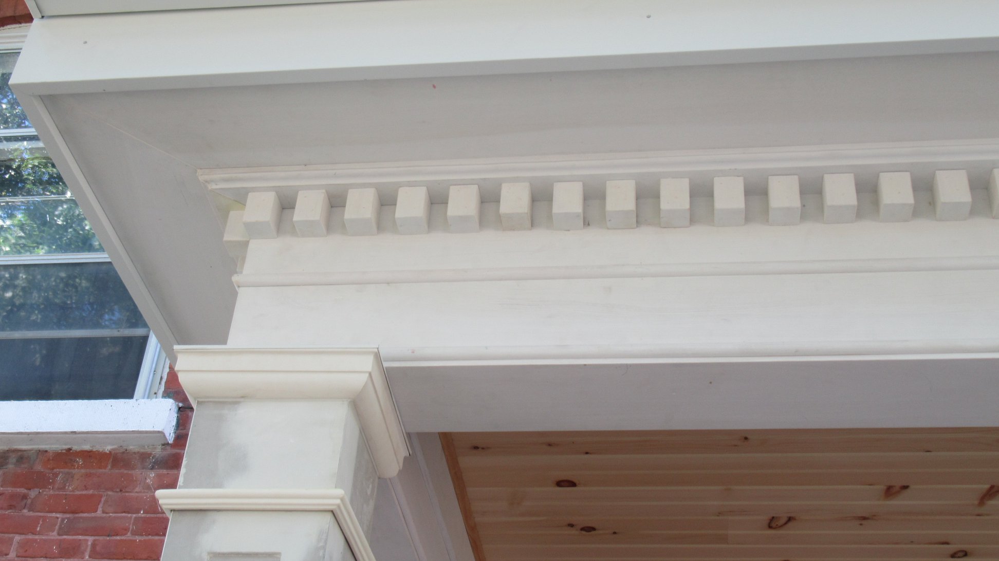 Detail of fine woodwork on from porch mouldings
